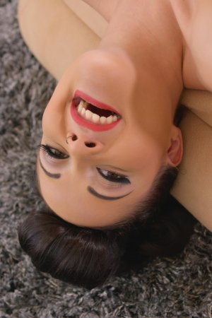 Pin up MILF Dolly Diore gives immense pleasure to your cock photo 17