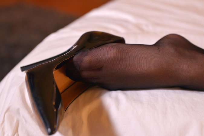 Foot fetish blonde Melanie Gold plays with her glass shoes photo 8