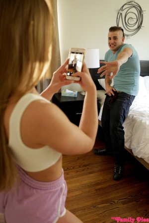 Daisy Stone catches half-naked dude and makes him please her photo 9