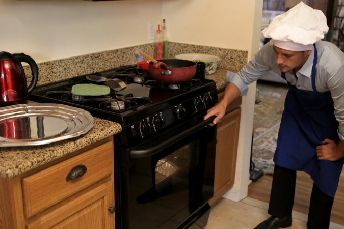 Talented chef fucks a gentle and skinny cutie in kitchen photo 1
